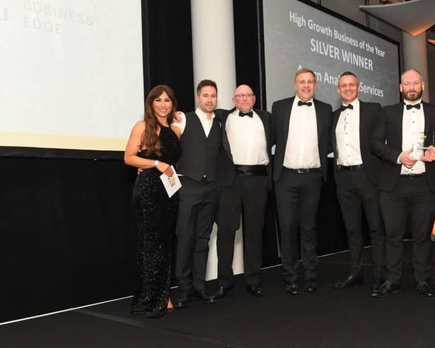 The team from Acorn Analytical Services celebrate their win