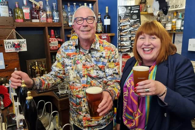 Alan Piggot and Tracie Clarke-Piggot behind the bar of the Little Ale House in High Street, Wellingborough