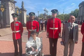 Roger and Mary outside Buckingham Palace about to enter for the Garden Party
