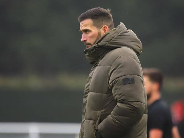 Roger Johnson watches on during Brackley Town's 3-0 victory over Kettering Town, which sent them to the top of the Vanarama National League North. Picture by Peter Short