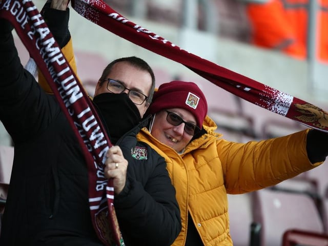 Northampton Town fans return to watch their team for the first game since 07.03.20 due to the coronavirus pandemic during the Sky Bet League One match between Northampton Town and Doncaster Rovers on December 05, 2020.