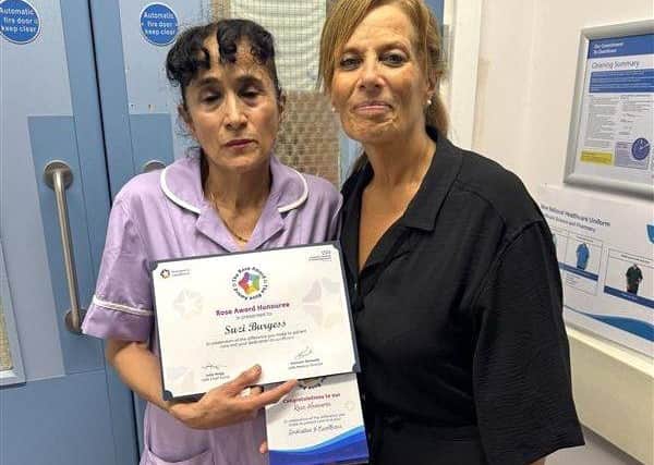 Healthcare Assistant Suzi Burgess was presented with her award by Director of Nursing Jo Smith.