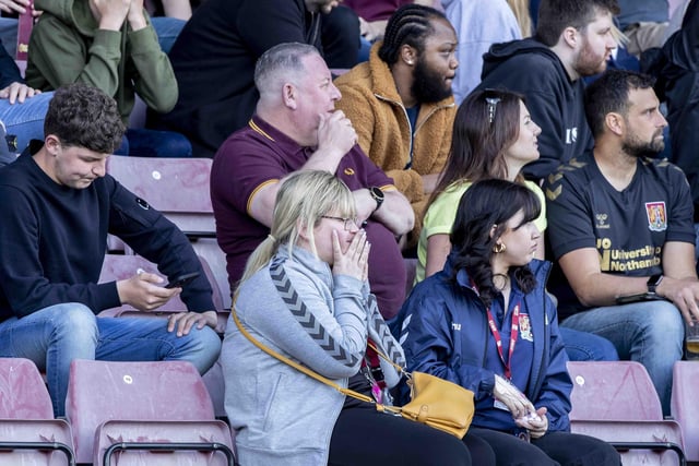 The Cobblers fans struggled to take in what was unfolding
