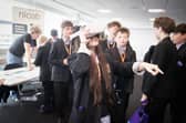 Some of the students at the Silverstone Park Futures Schools Programme event inside the Silverstone Wing