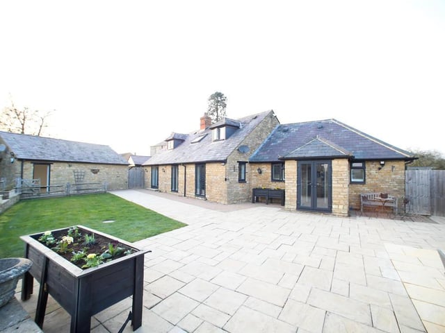 This barn conversion with traditional features and a lot of land could be yours for £1.75 million.