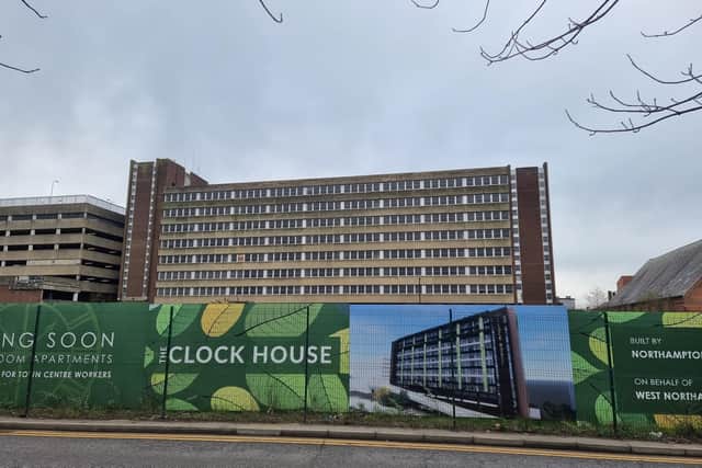 Adverts for The Clock House saying 'coming soon' are still up despite the plans being 'temporarily paused' by the council. Belgrave House lies behind the hoardings.