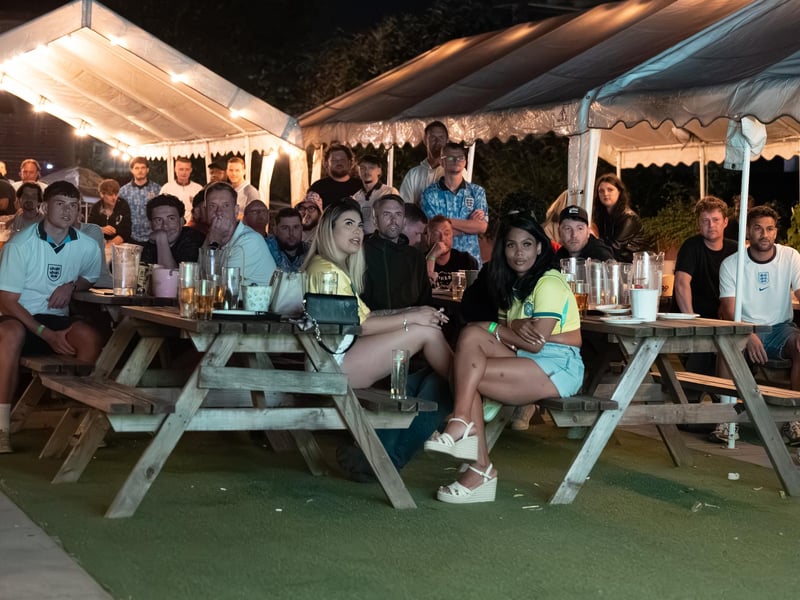 Football fans watching England vs Mexico in the garden of The Black Prince in Northampton. Photo by David Jackson.