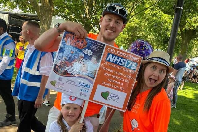 Christina Kelly works at Northamptonshire Health Charity, pictured with her family at the Carnival