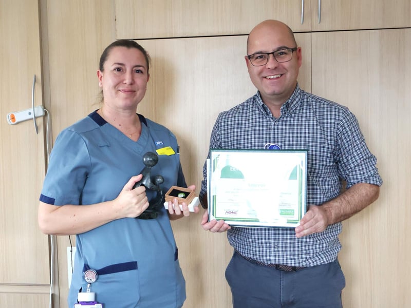 Midwife Lexi Fair presented with her award by Director of Nursing Robin Binks