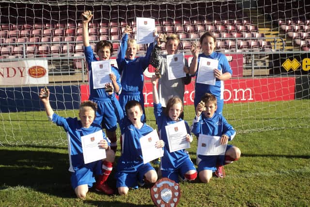 Children from Hopping Hill Primary School won the year 6 County Summer Cup at Sixfields. The event was organised by Northampton Town Football Club.