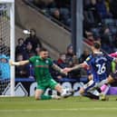 Rochdale goalkeeper Richard O'Donnell saves from Northampton's D'Margio Wright-Phillips in stoppage-time during the 1-1 draw at Spotland in February
