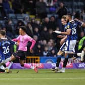 Rochdale goalkeeper Richard O'Donnell saves from Northampton's D'Margio Wright-Phillips in stoppage-time during the 1-1 draw at Spotland in February