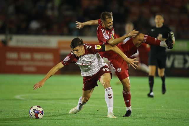 Kieron Bowie battles for possession in the win at Crawley (Picture: Pete Norton)