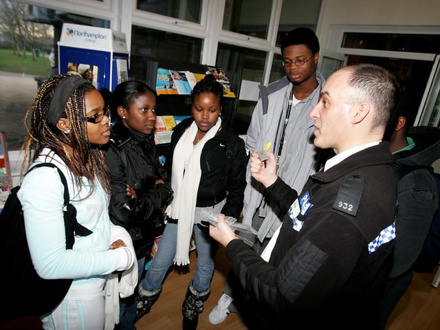 PC Dave Holmes talking to students at Northampton College about the dangers of thefts from students .