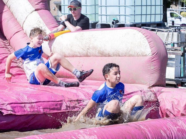 Children were all smiles on Saturday July 12 when they took part in the Race for Life, five kilometre obstacle course in Abington Park, Northampton.