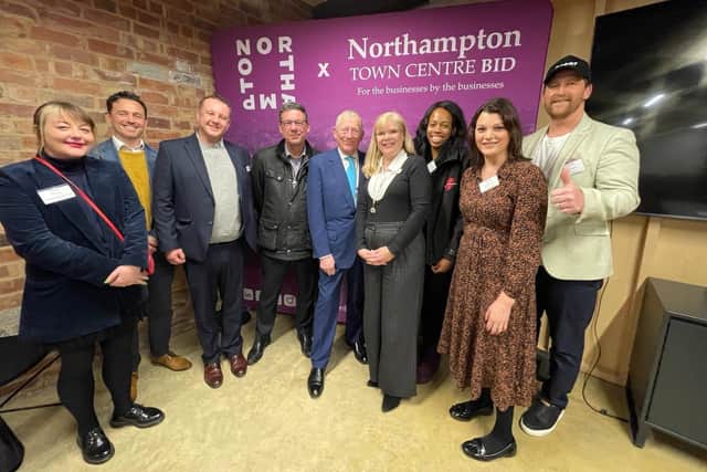 Nick Hewer with representatives from teams and charities taking part in the Franklins £50 Challenge