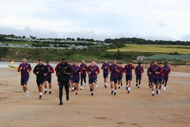 The Cobblers players can look forward to some more beach running in July
