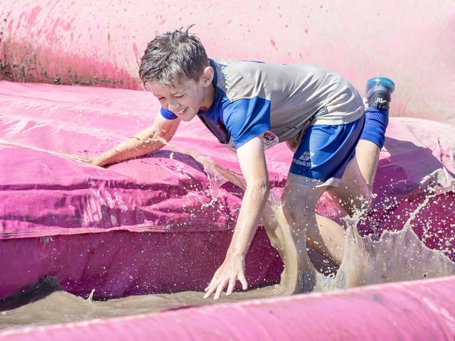 Children were all smiles on Saturday July 12 when they took part in the Race for Life, five kilometre obstacle course in Abington Park, Northampton.