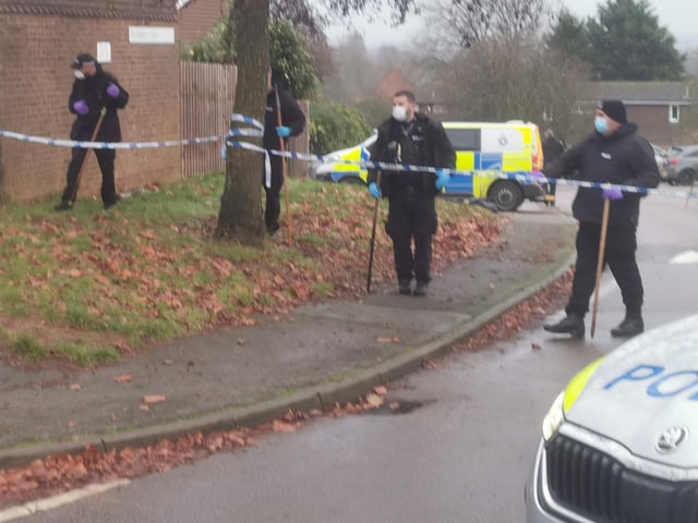 This was the crime scene in Flaxwell Court, Standens Barn, on Thursday at 3pm, where police were investigating the murder of a man in his 20s.