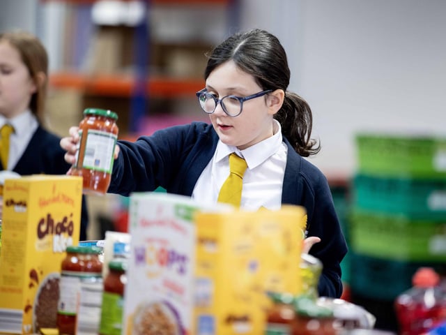 70 bags of food were packed by the 11 hardworking students, who learnt the importance of showing kindness and empathy to the community.