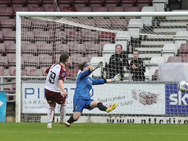 Alex Dicks slots home the opening goal.