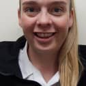 Disa Grace, a custodial manager at HMP Onley in Northamptonshire, in her prison uniform