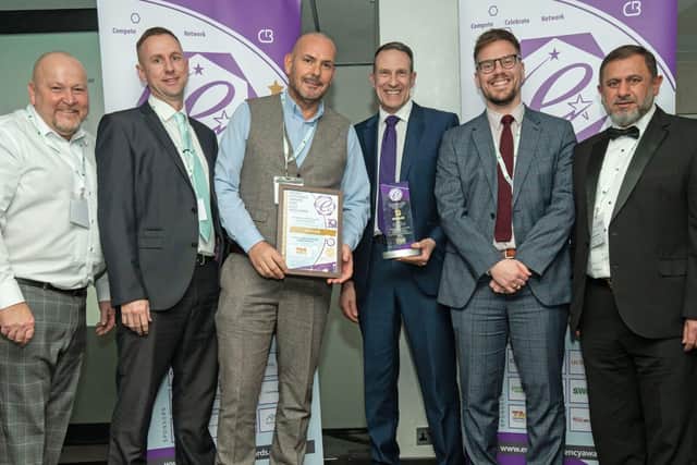 Members of the Best Large Scale project receive their award