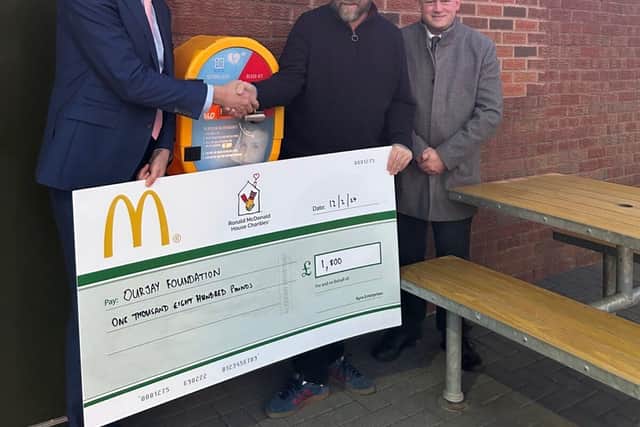 Local franchisee Glyn Pashley and OurJay Foundation unveil the new defibrillator machines