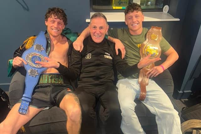 Ben Fail (left) celebrates his title win with twin brother Carl and mentor and Far Cotton ABC coach John Daly