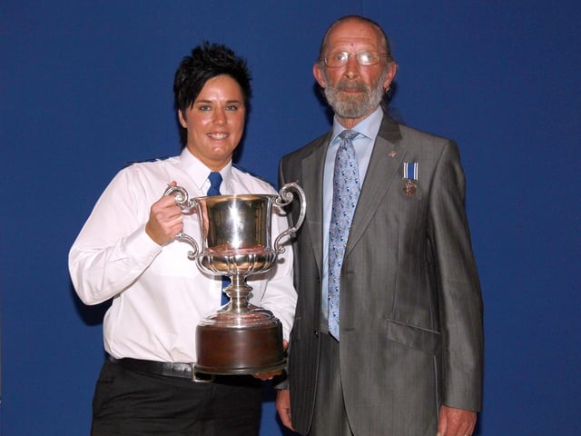 2013 - Northamptonshire Police Long Service awards ceremony takes place at their Headquarters, Wootton Hall, Northampton. Hughes Cup, PCSO of the year, Naomi Burkat, presented by Dixie Hughes.