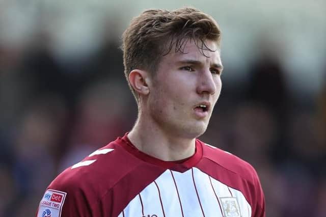 Harvey Lintott was struggling with his hamstring in the first-half against Gillingham
