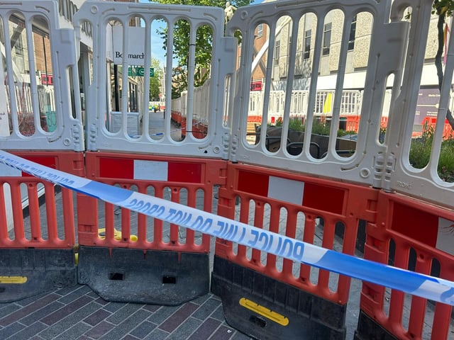 The main shopping street in Northampton town centre remains cordoned off.