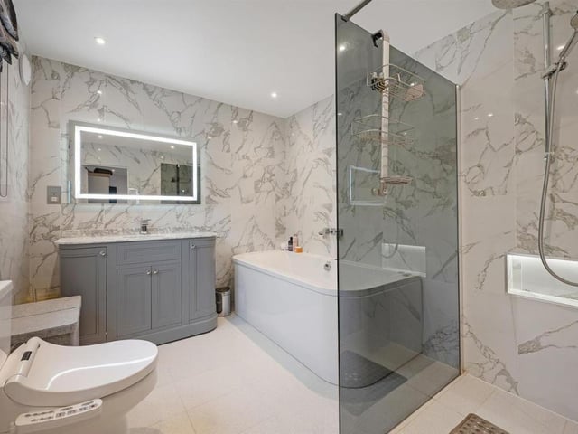 Here is another one of the home's stunning contemporary bathrooms.