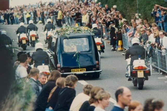 Crowds of mourners, flowers and tributes lined the Princess' route through the town to Althorp.