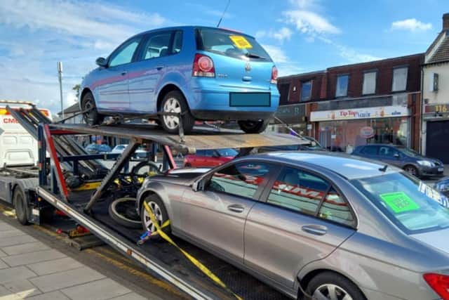 Two of the cars seized by Northamptonshire Police
