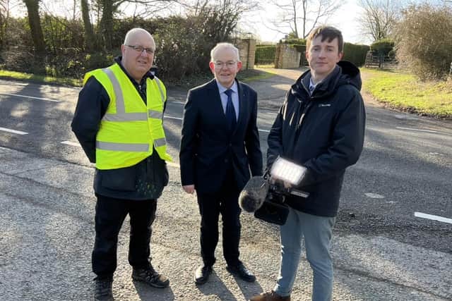 Mr Pothole, Cllr Ian McCord and Will Hollis from GB News inspect the A5