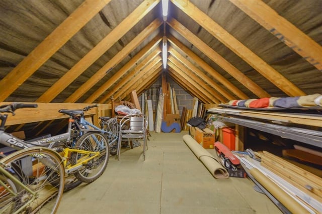 The attic has been converted into a roomy storage space to suit any needs