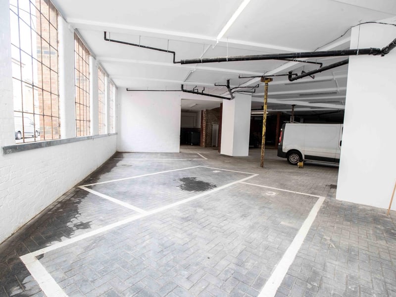 The Grade II listed former shoe factory has been converted into 89 stylish apartments by the OEH Group
