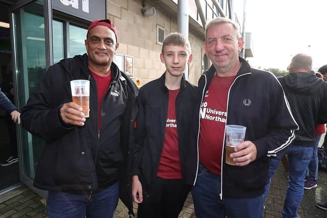Fans at Sixfields supporting the recyclable cups scheme