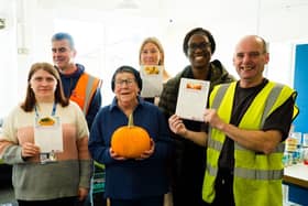 Volunteers share pumpkin recipes with Larder customers