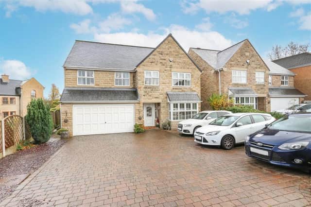 The detached house at Holymoor Road, Holymoorside has a guide price of £700,000.