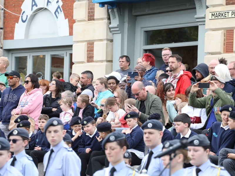 Kettering town centre: crowds line town centre to welcome The Royal Anglian Regiment for Armed Forces Day parade /National World