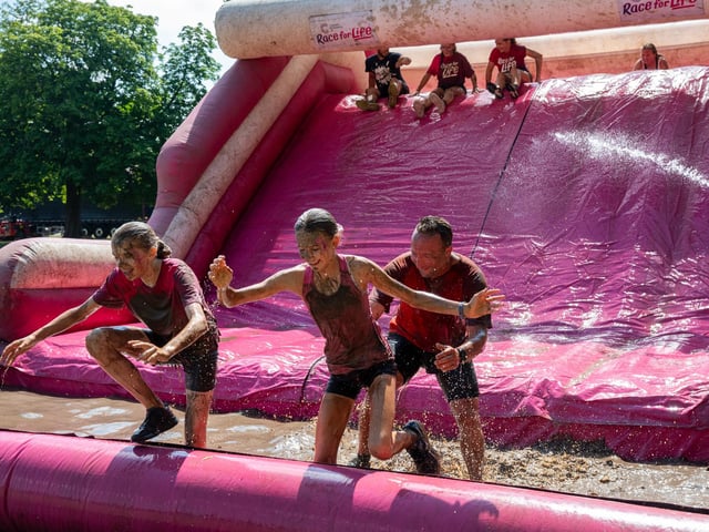 Runners taking part in the Pretty Muddy Race For Life at Abington Park in Northampton on Saturday, July, 11, 20026. Photo by David Jackson.