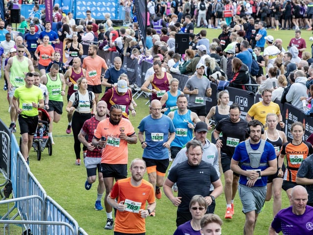 Hundreds of runners braved showers and wind to take on the race on Sunday (May 25), which started and finished at Sixfields stadium.