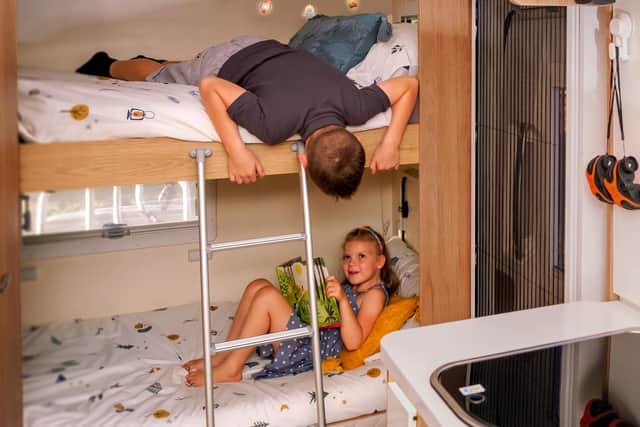 Ultimate Adventure Van from Camplify with comfy beds for the children