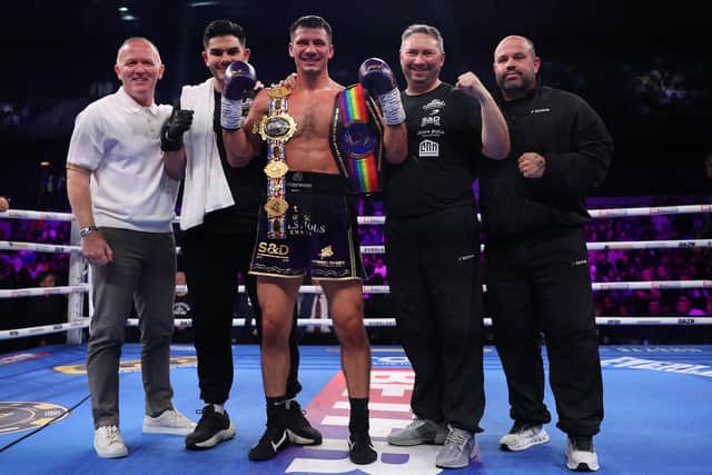 Kieron Conway celebrates his title win with dad James and the rest of the Team Shoe-Box crew (Picture: Mark Robinson / Matchroom Boxing)