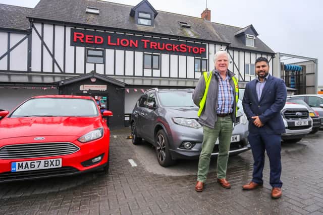 Stuart Willetts, the UK Network Business Development Manager for SNAP (L) and Ali Sadrudin, the owner of the Red Lion Truck Stop.
