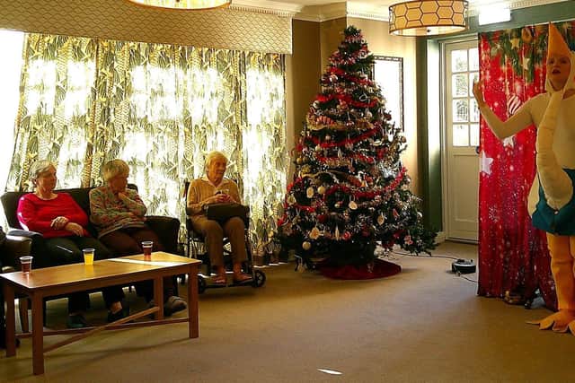 Residents in the home lounge watched on as the performance unfolded