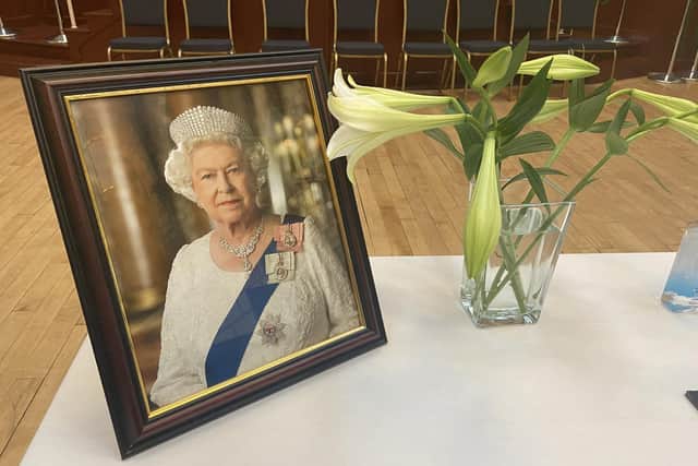 People were invited to pay their respects to Queen Elizabeth II and write in a condolence book at The Guildhall today (September 9).