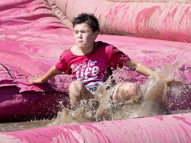 Children were all smiles on Saturday July 12 when they took part in the Race for Life, five kilometre obstacle course in Abington Park, Northampton.